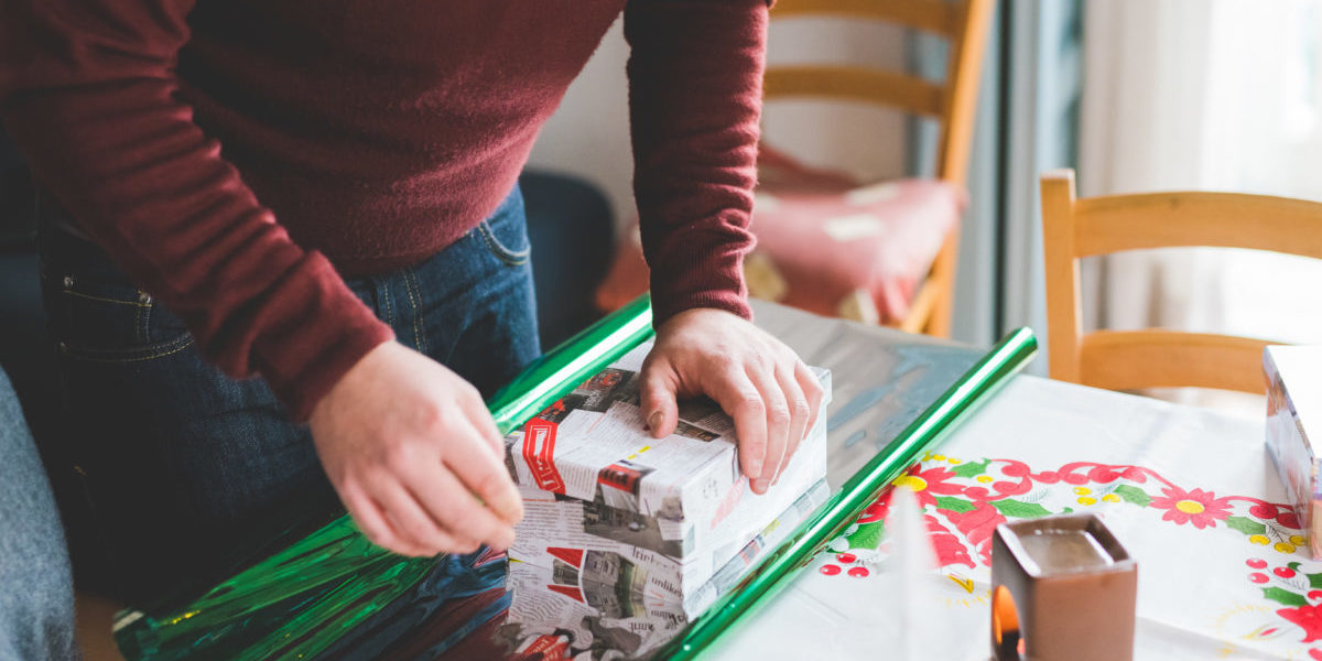 graphicstock-close-up-on-hands-of-young-man-wrapping-christmas-present-christmas-holiday-concept_rpO3laYkZ wrapping up the year