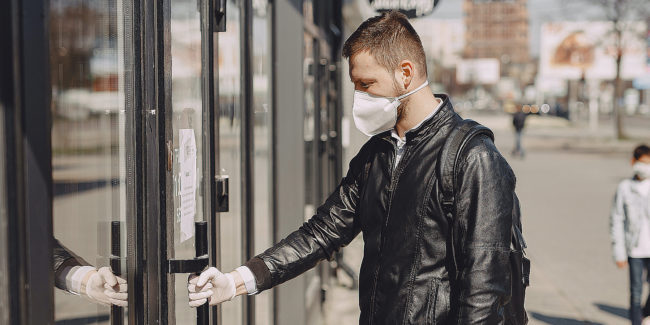 Man opening commercial door Extended Deadline for Income Tax Returns – Need Help?